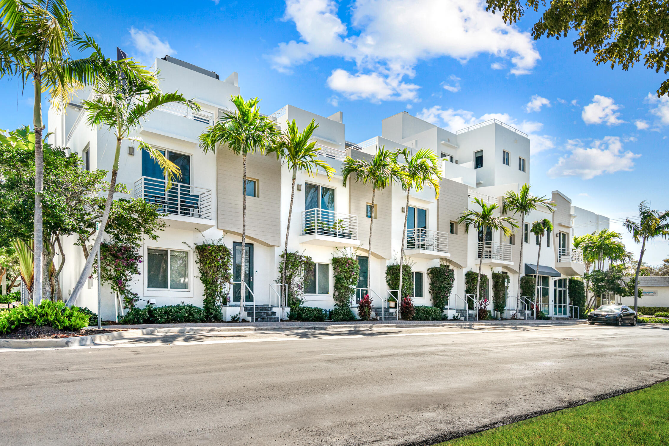 111 Southeast 2nd Street, Unit 401 Delray Beach, FL 33444 - Photo 33 of 38 front view of a building with a street