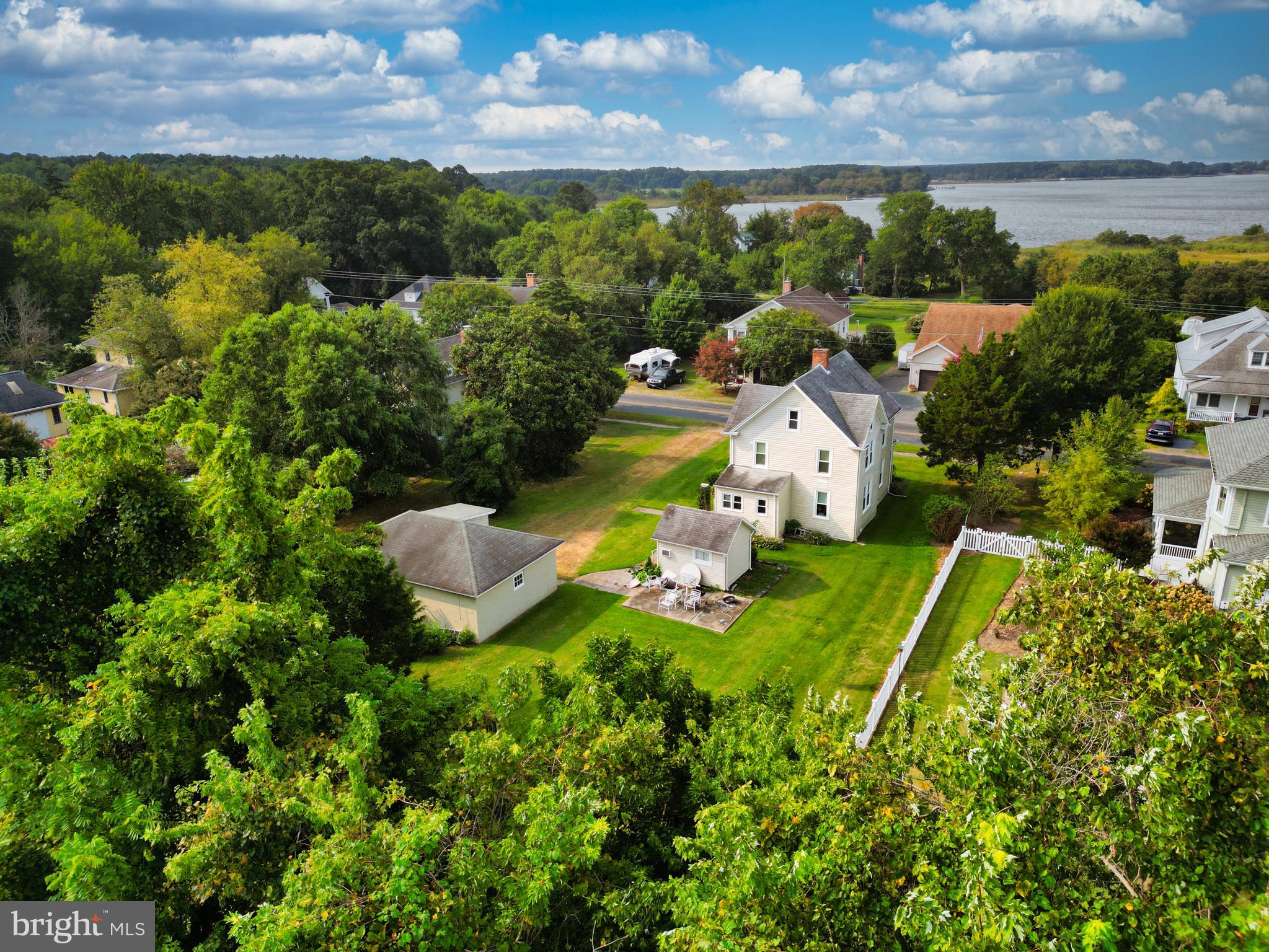 an aerial view of a house with a garden