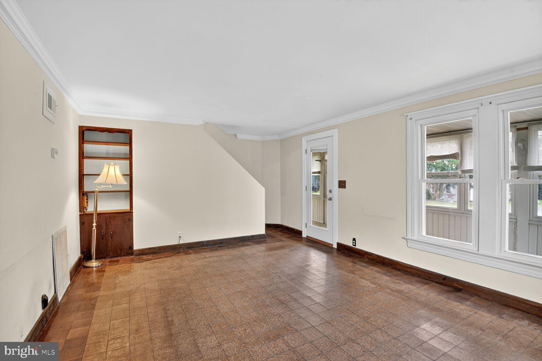 10437 Main Street Claiborne, MD 21624 - Photo 14 of 44 an empty room with windows