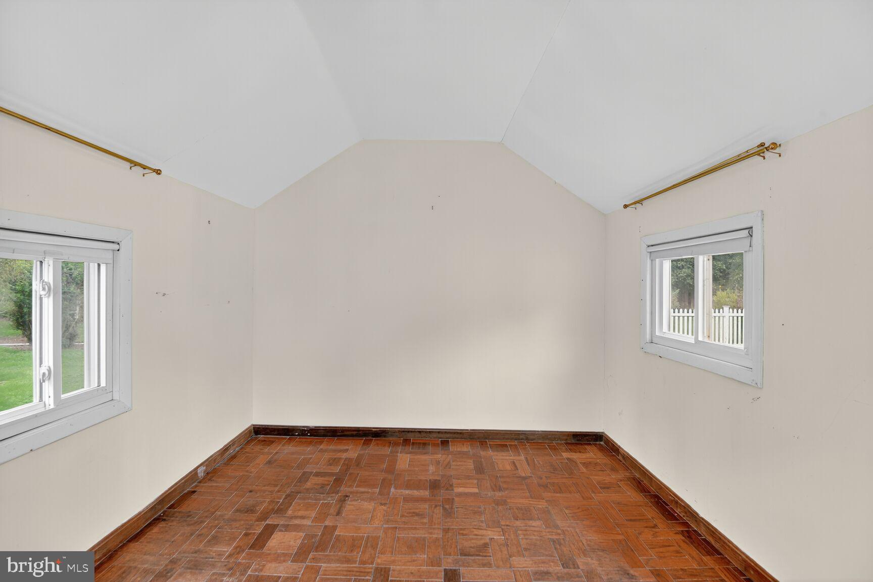 10437 Main Street Claiborne, MD 21624 - Photo 26 of 44 a view of an empty room with a window