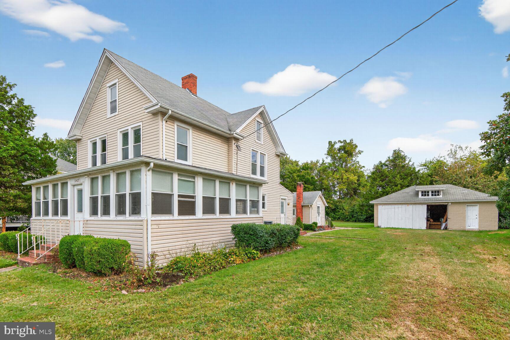 10437 Main Street Claiborne, MD 21624 - Photo 27 of 44 a house view with a garden space
