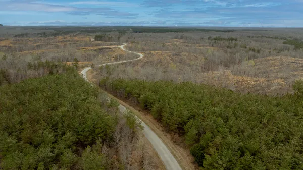 a view of a lake from a yard