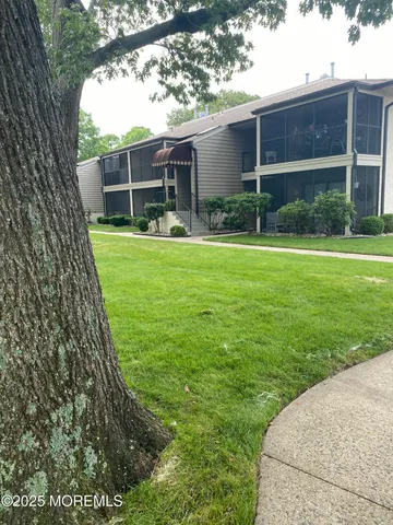 a view of outdoor space yard and front view of a house