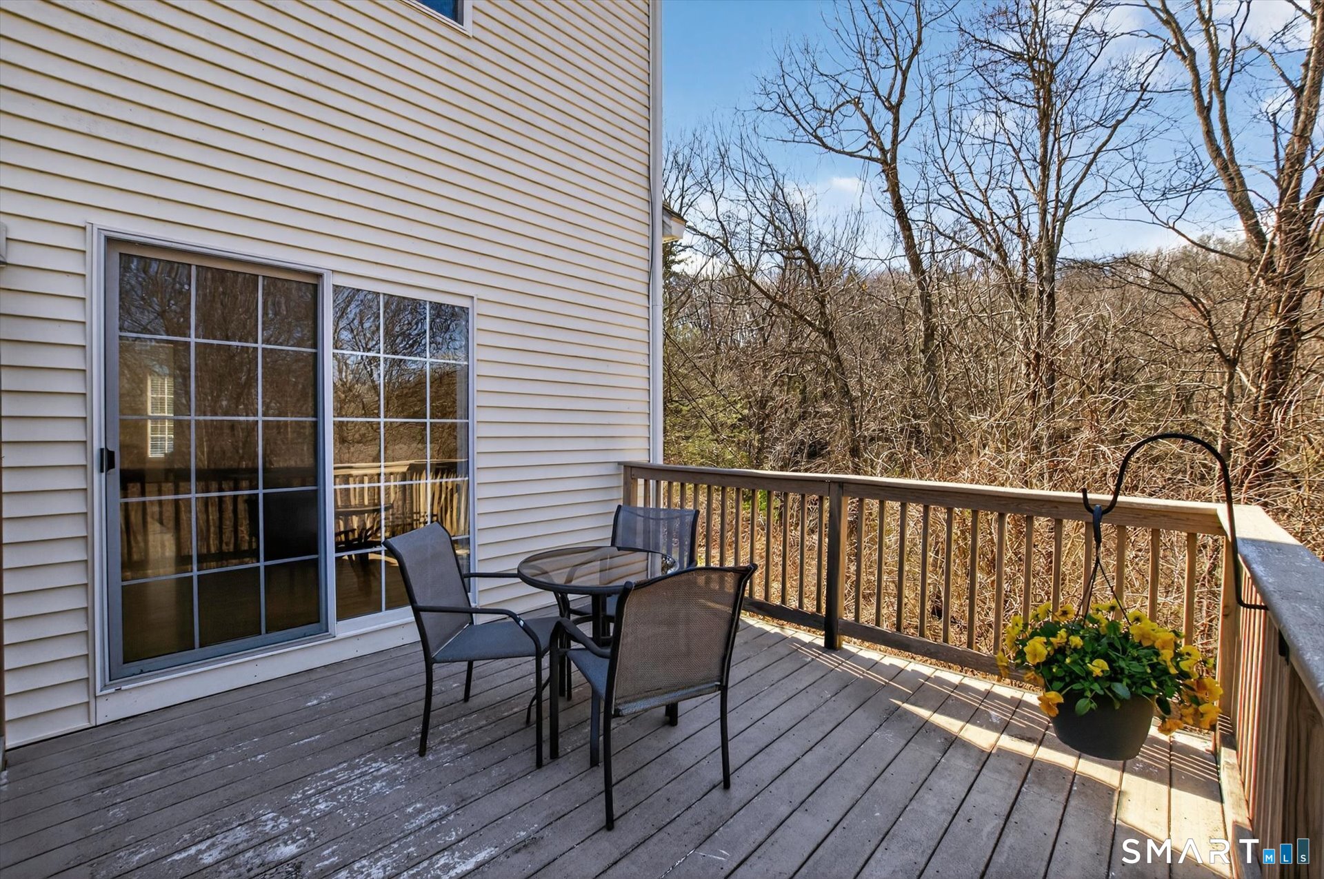 16 A Claire Hill Road Burlington, CT 06013 - Photo 15 of 37 a view of a chair and table on the wooden deck