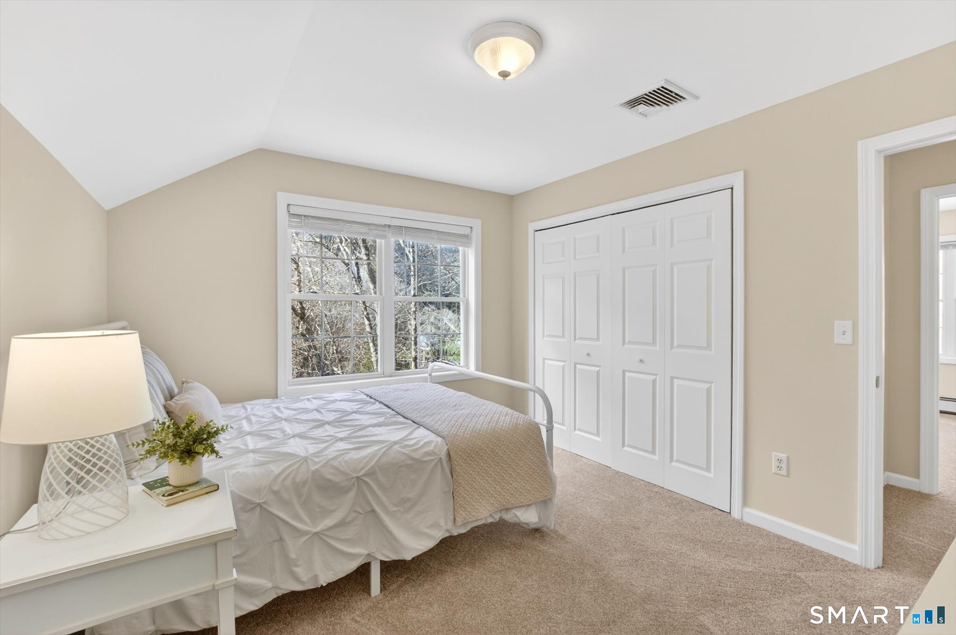 16 A Claire Hill Road Burlington, CT 06013 - Photo 17 of 37 a spacious bedroom with a bed and a window