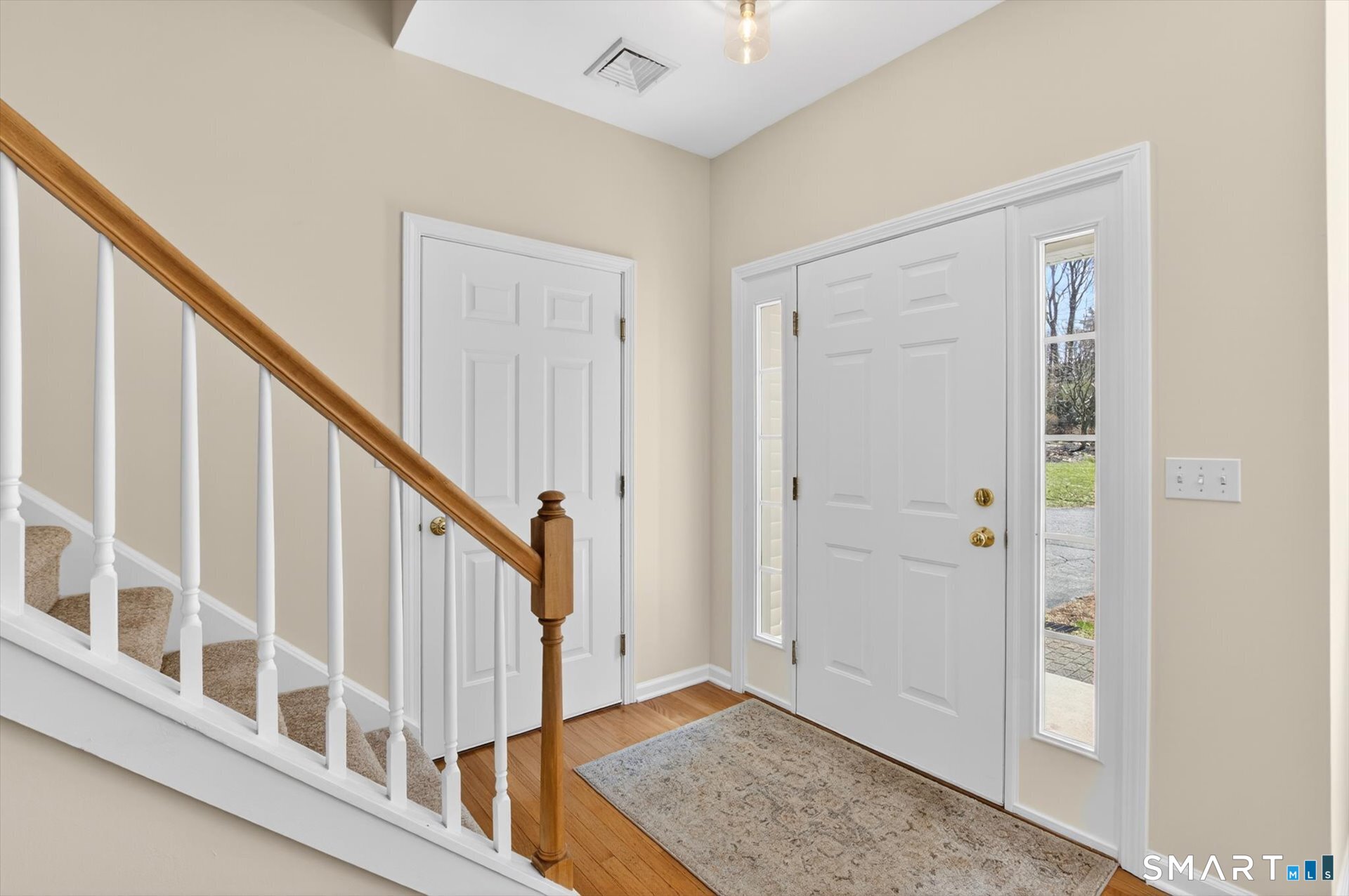 16 A Claire Hill Road Burlington, CT 06013 - Photo 2 of 37 a view of an entryway with staircase