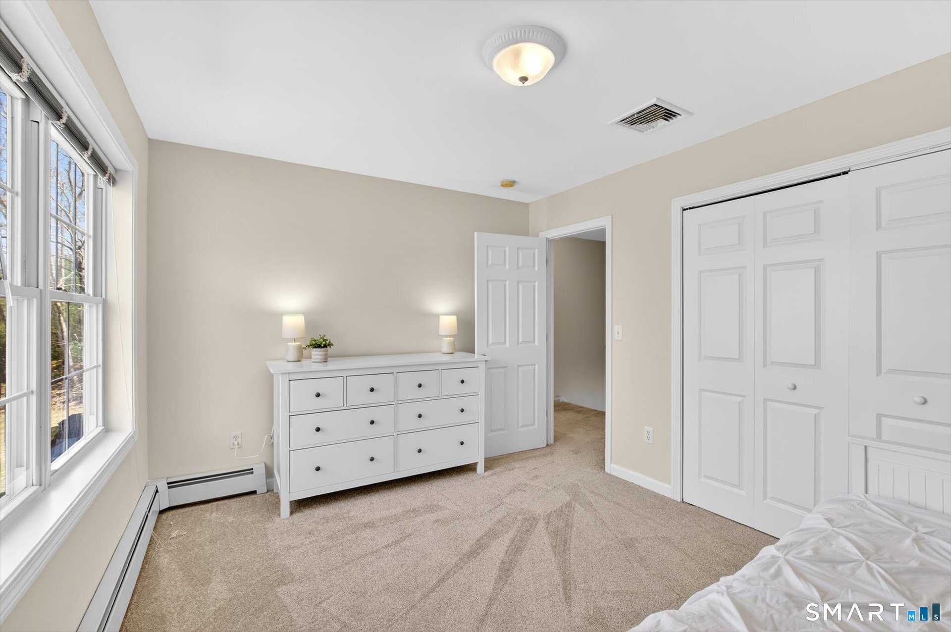 16 A Claire Hill Road Burlington, CT 06013 - Photo 22 of 37 an empty room with windows and cabinet
