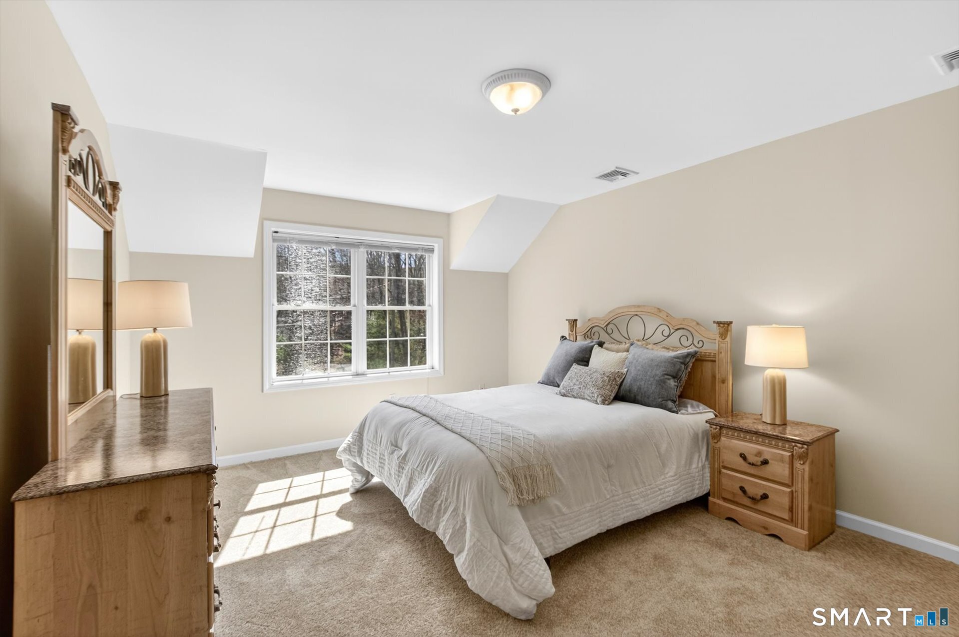 16 A Claire Hill Road Burlington, CT 06013 - Photo 23 of 37 a bedroom with a bed and a window