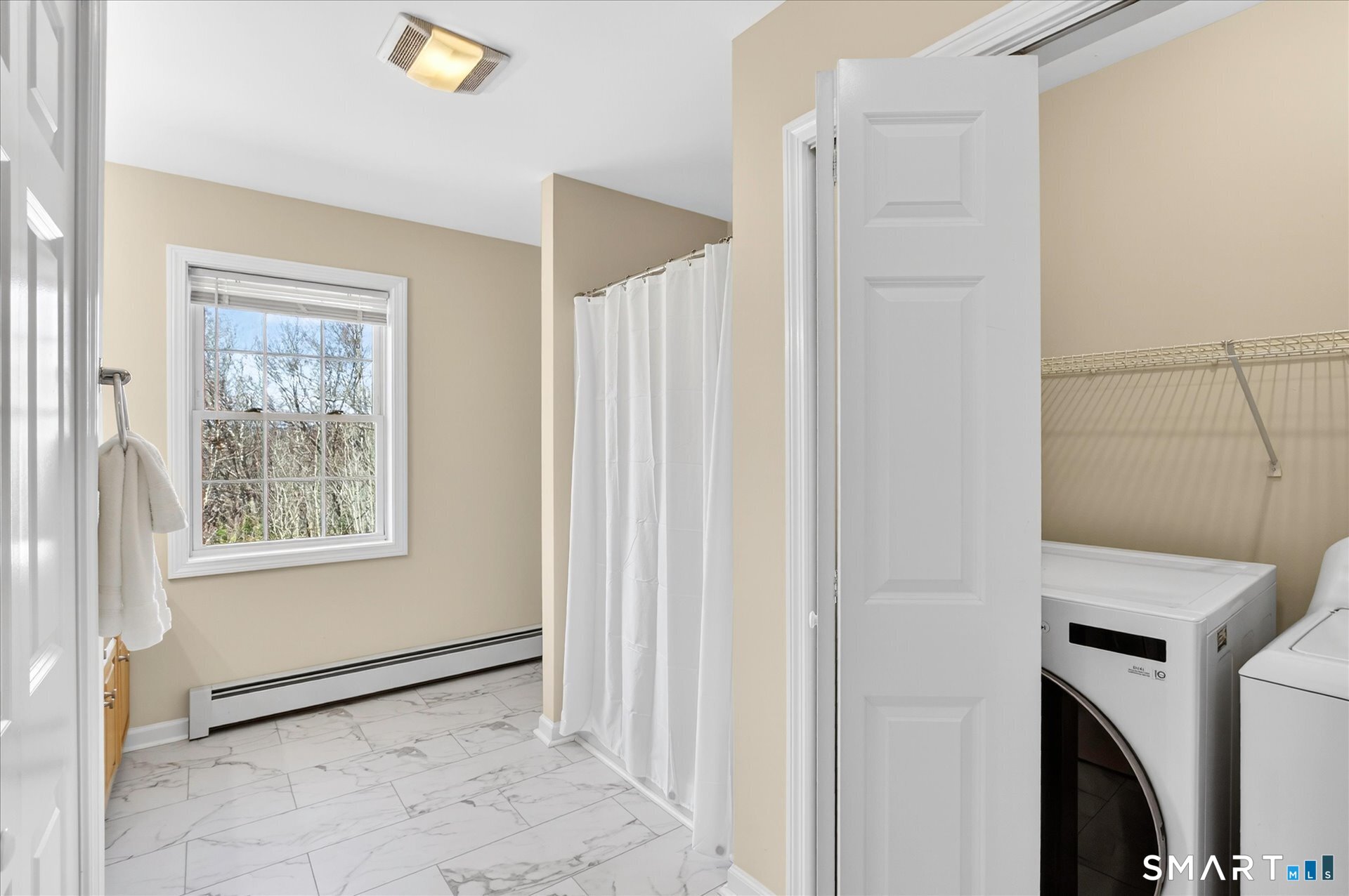 16 A Claire Hill Road Burlington, CT 06013 - Photo 27 of 37 a view of a room with a washer and dryer