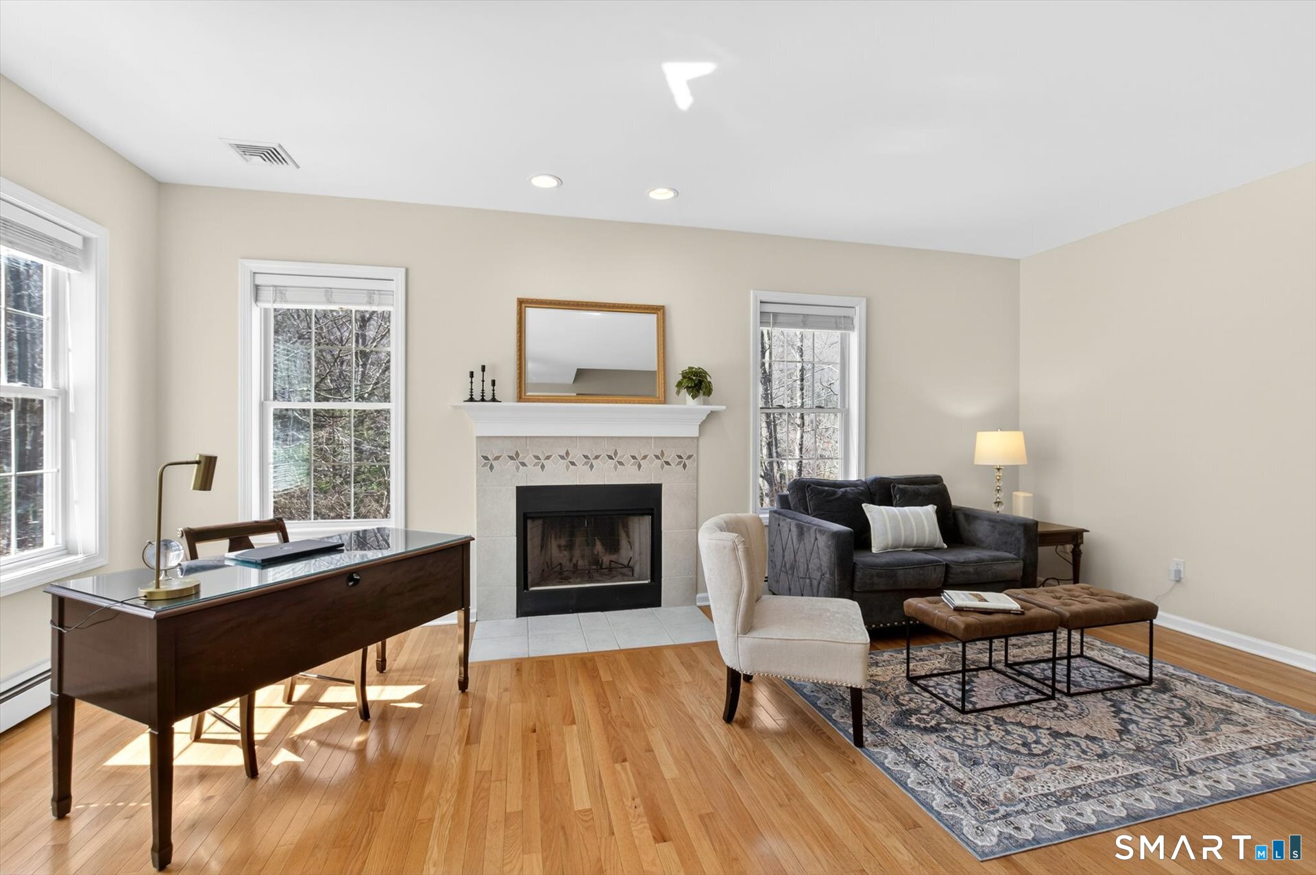 16 A Claire Hill Road Burlington, CT 06013 - Photo 3 of 37 a living room with furniture and a fireplace