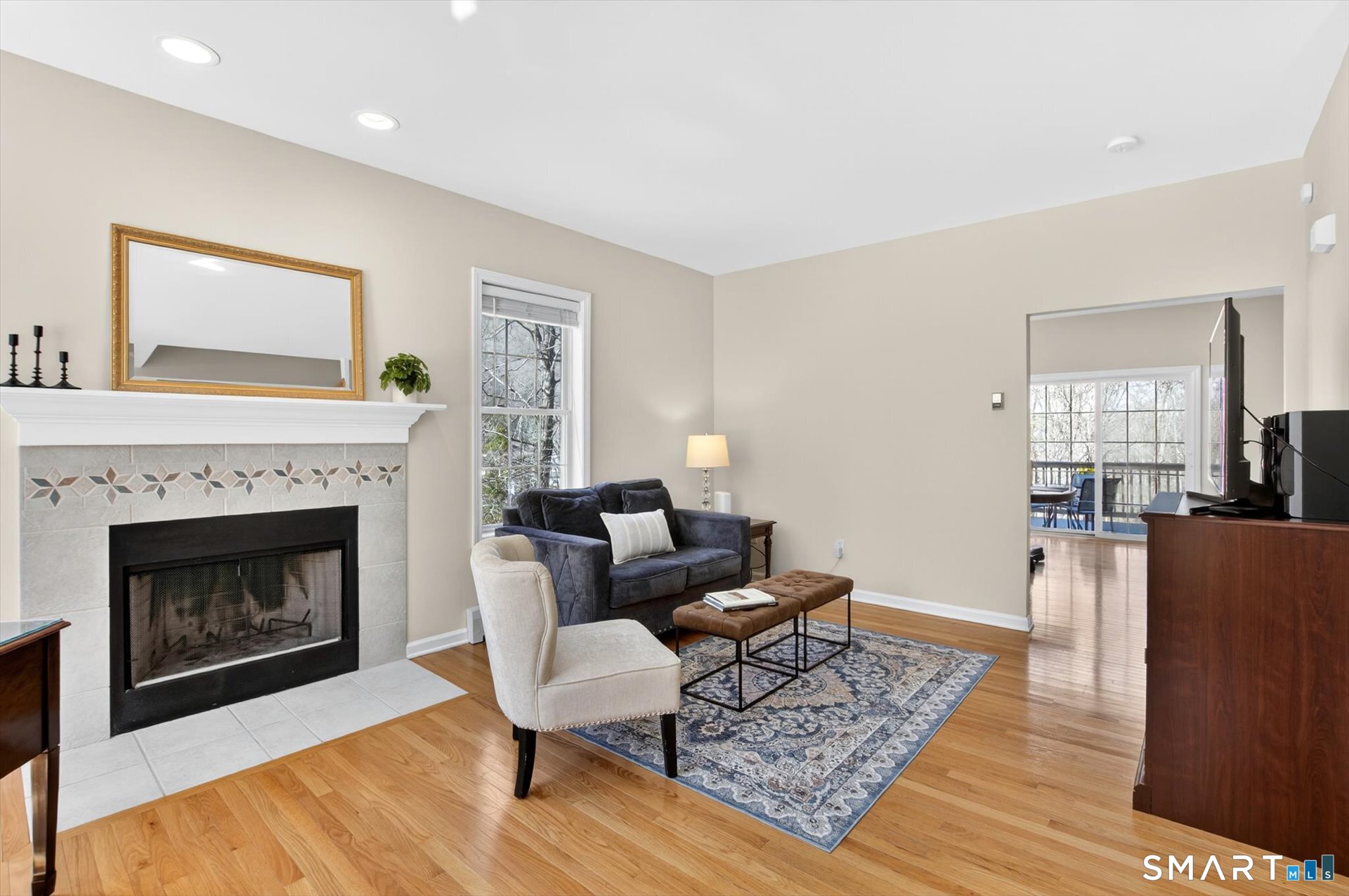 16 A Claire Hill Road Burlington, CT 06013 - Photo 6 of 37 a living room with furniture and a fireplace