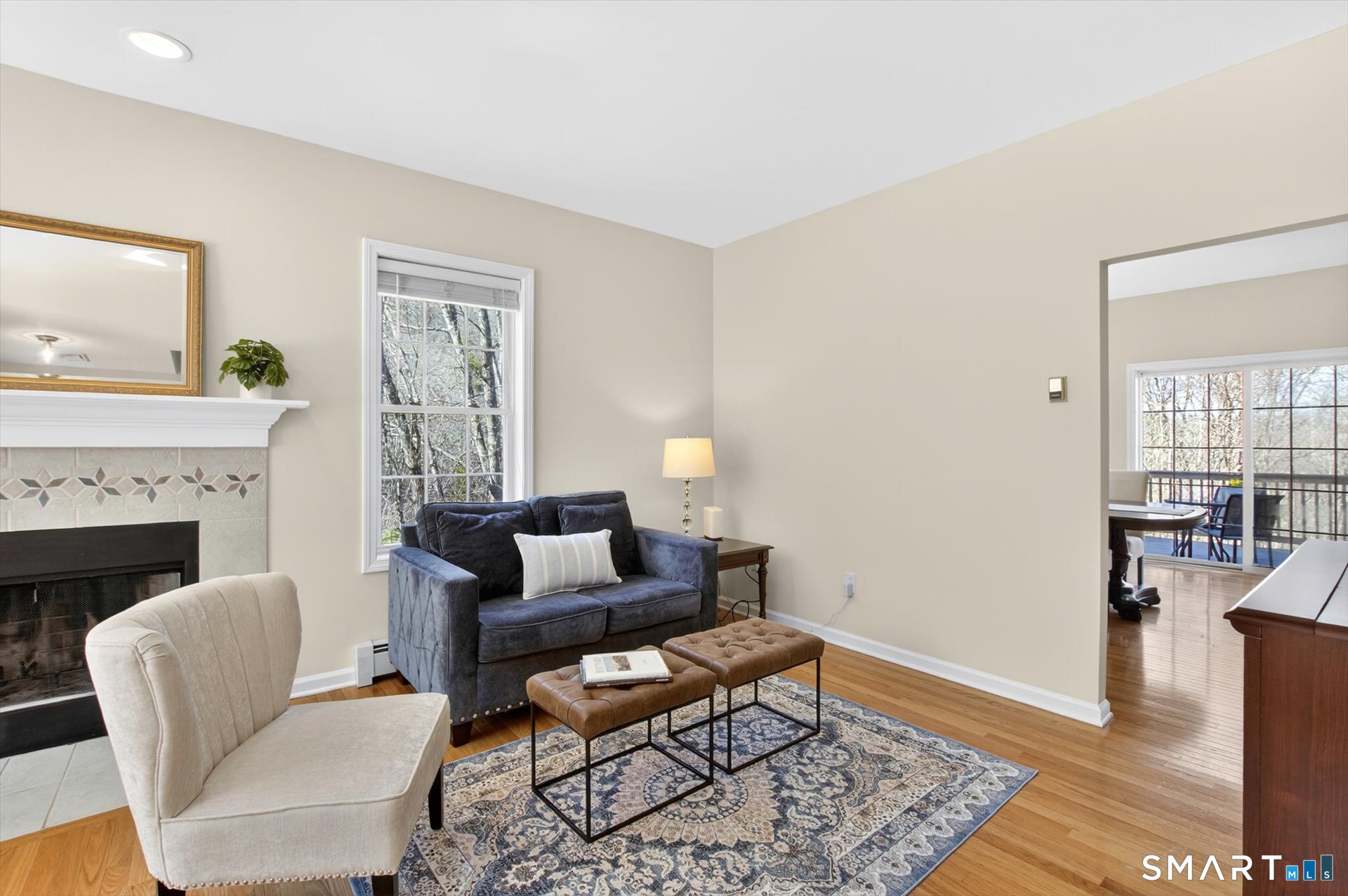 16 A Claire Hill Road Burlington, CT 06013 - Photo 7 of 37 a living room with furniture and a fireplace