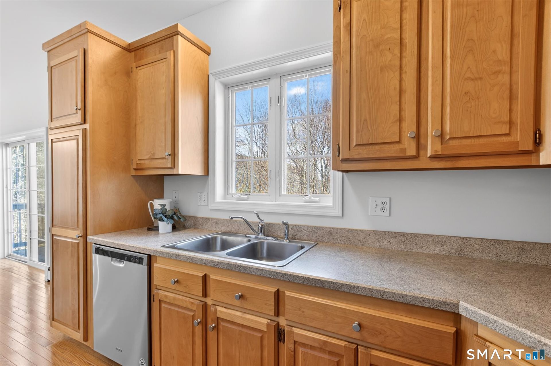 16 A Claire Hill Road Burlington, CT 06013 - Photo 10 of 37 a kitchen with stainless steel appliances granite countertop a sink a refrigerator and cabinets