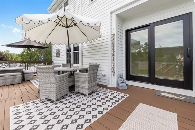a outdoor space with patio the couches and a potted plant