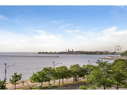 a view of a chairs and table in the patio