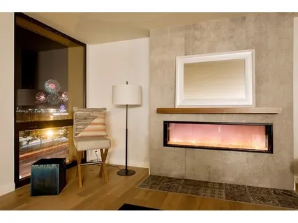 a picture of a room with wooden floor and windows