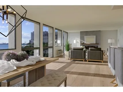 a living room with a couch and a flat screen tv