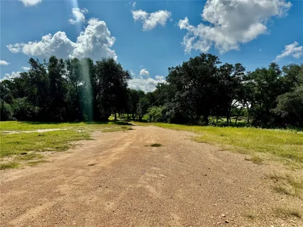 a view of a swimming pool and an outdoor space