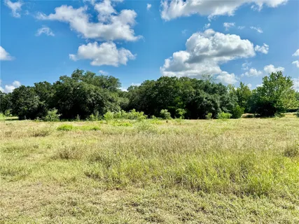 a view of an outdoor space and a yard