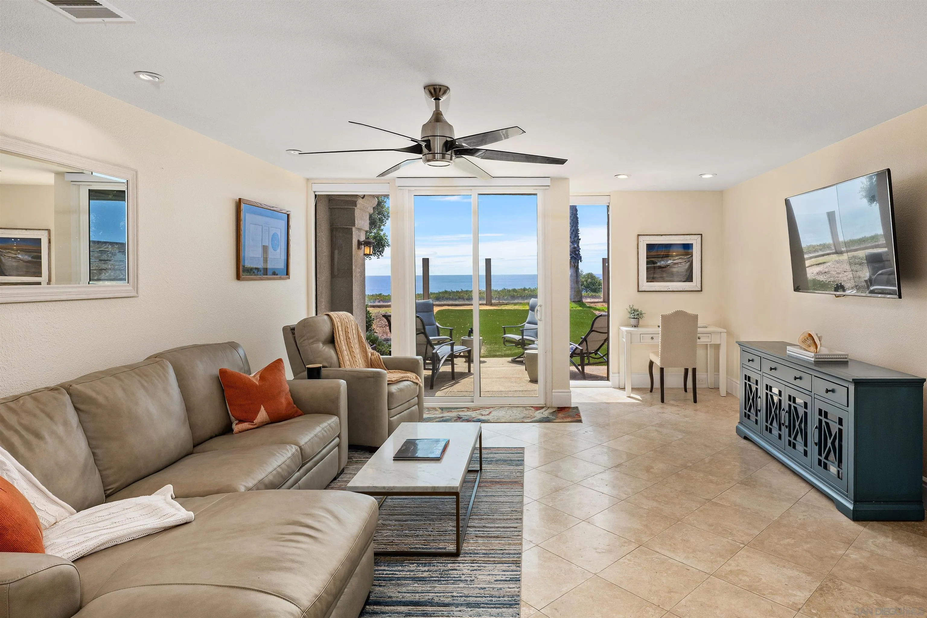 920 Sealane Drive, Unit B Encinitas, CA 92024 - Photo 10 of 10 a living room with furniture and a large window