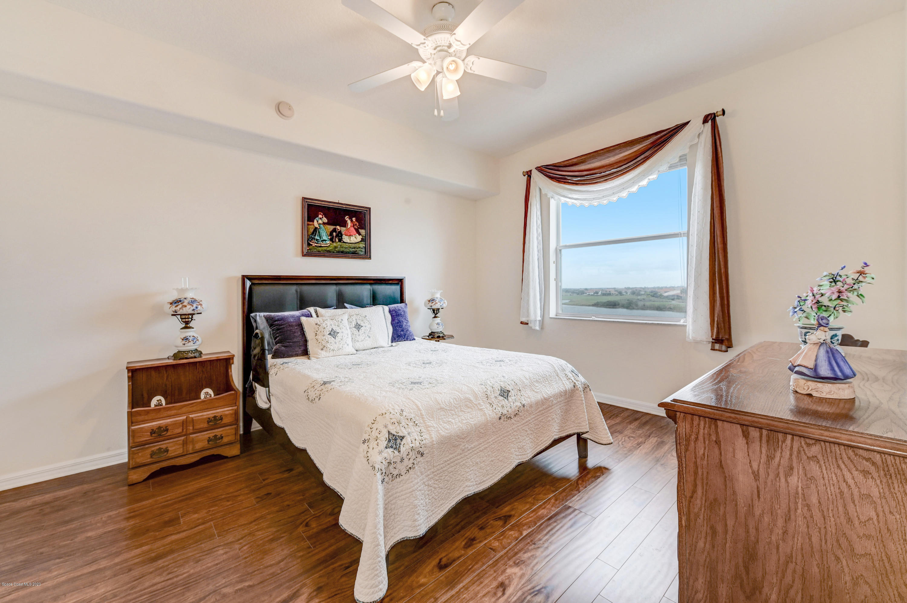 6848 Toland Drive, Unit 404 Melbourne, FL 32940 - Photo 12 of 36 Master Bedroom/Water Views