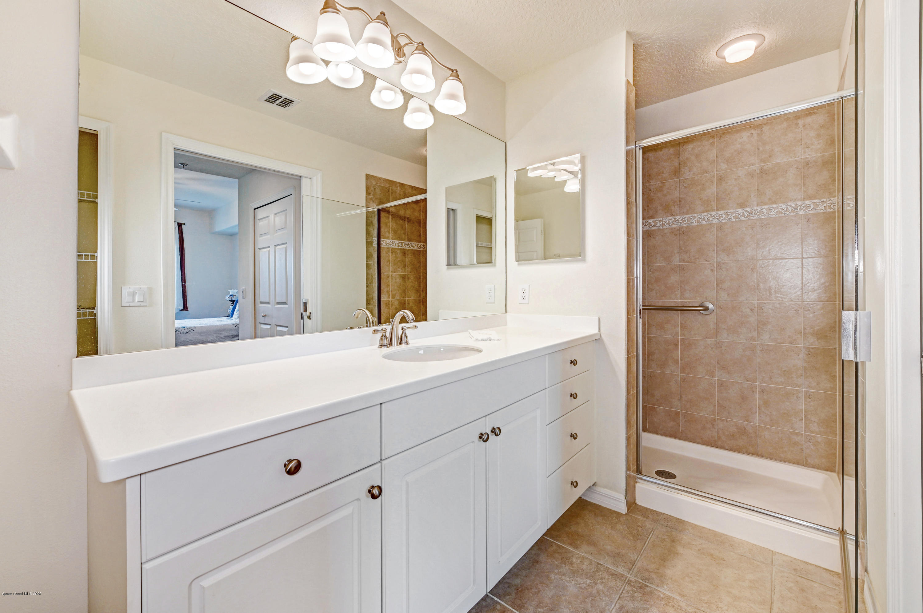 6848 Toland Drive, Unit 404 Melbourne, FL 32940 - Photo 15 of 36 Master Bath/Shower