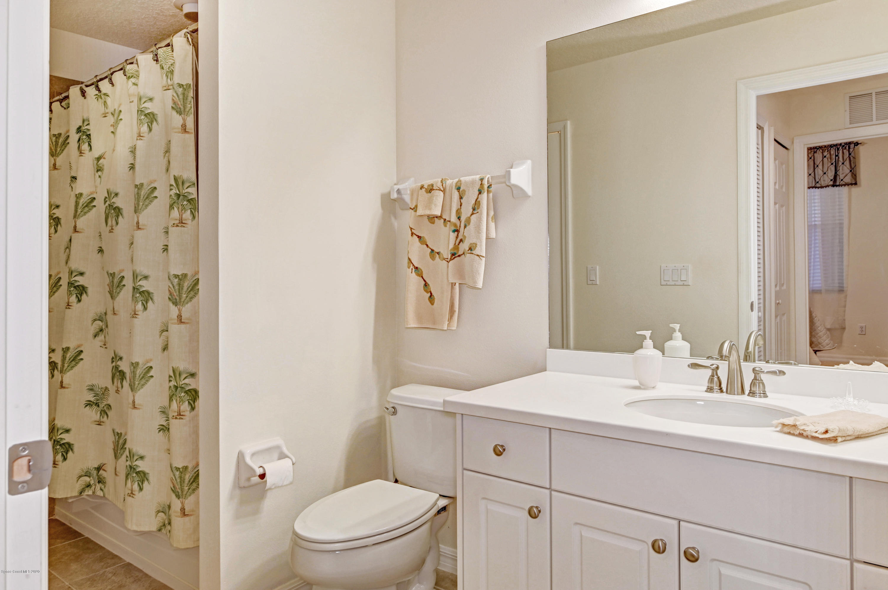 6848 Toland Drive, Unit 404 Melbourne, FL 32940 - Photo 17 of 36 Guest Bath
