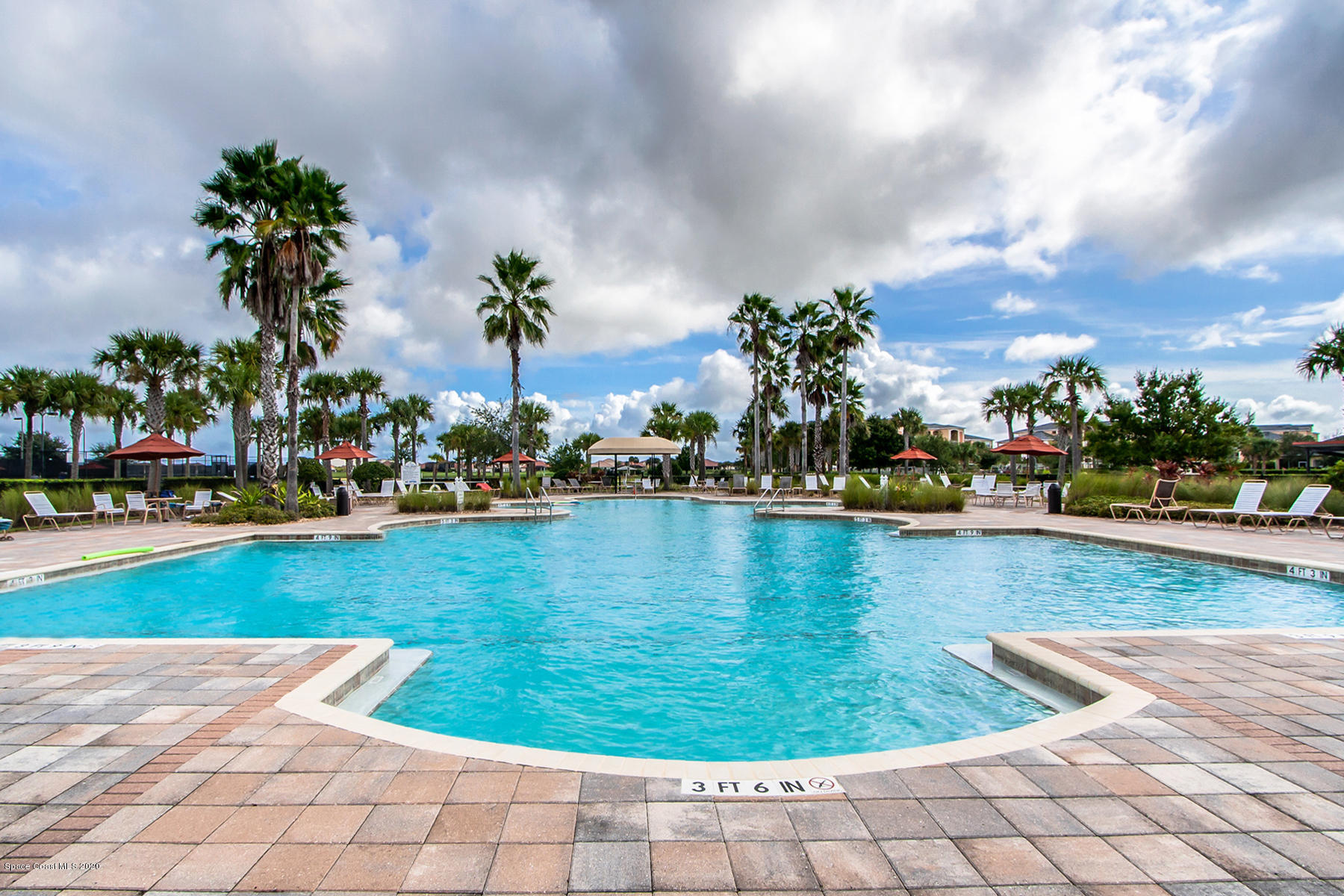 6848 Toland Drive, Unit 404 Melbourne, FL 32940 - Photo 29 of 36 Heated Pool
