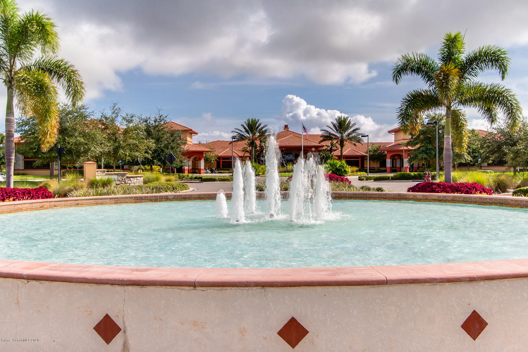 6848 Toland Drive, Unit 404 Melbourne, FL 32940 - Photo 36 of 36 Clubhouse beyond Fountains