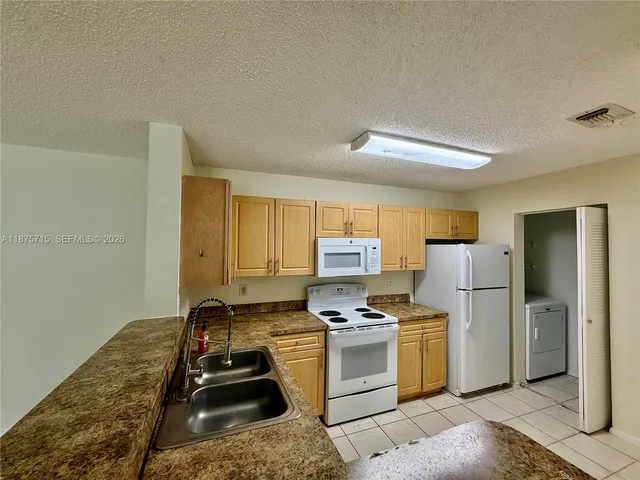 $2,450 | 11211 West Atlantic Boulevard, Unit 201, Coral Springs, FL 33071