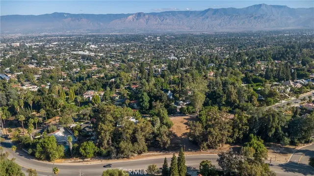 an aerial view of residential house and outdoor space
