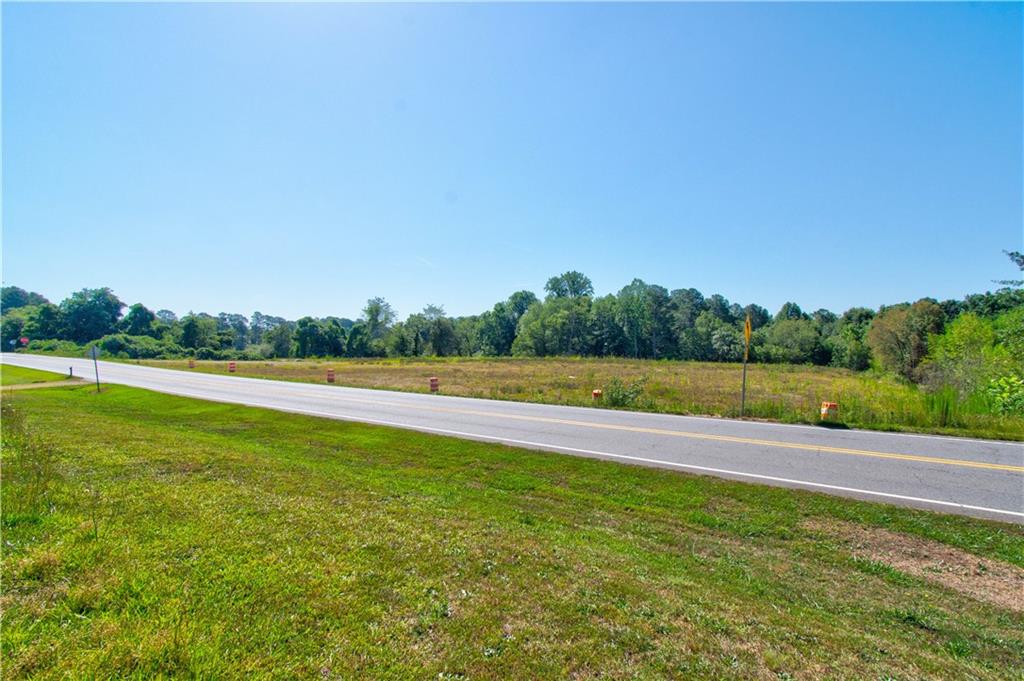 0 Nix Bridge Road Dawsonville, GA 30534 - Photo 18 of 21 a view of a green field with clear sky