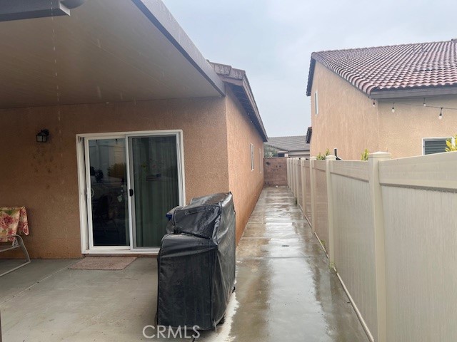 34434 Solstice Street Winchester, CA 92596 - Photo 11 of 11 a balcony with furniture and wooden floor