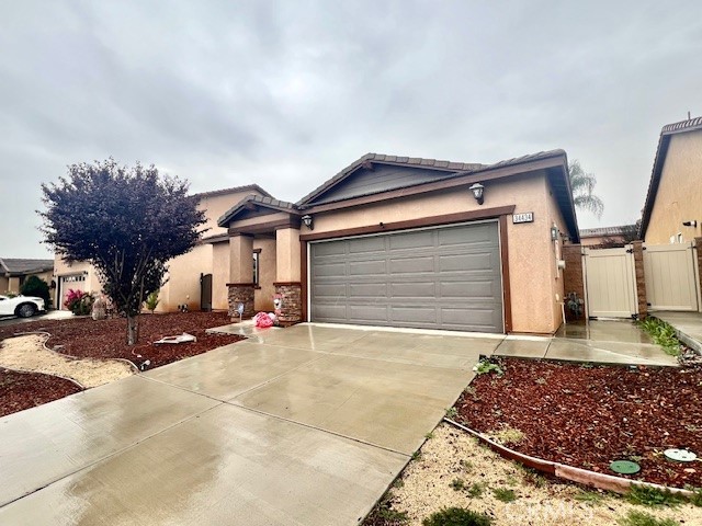 34434 Solstice Street Winchester, CA 92596 - Photo 4 of 11 a view of a house with a snow in the yard