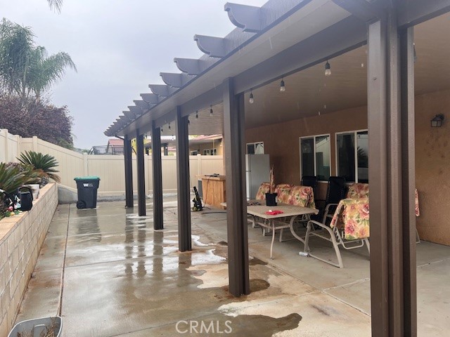 34434 Solstice Street Winchester, CA 92596 - Photo 10 of 11 a living room with furniture and a potted plant