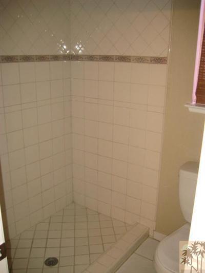 45655 Rogue River Road Indio, CA 92201 - Photo 8 of 12 a bathroom with a shower