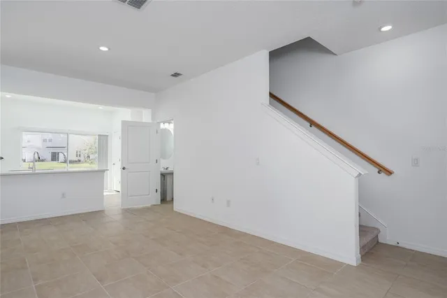 a view of a kitchen with a sink