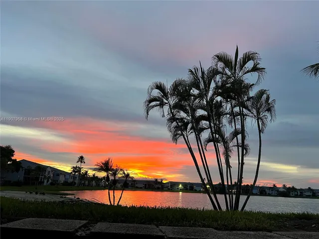 a view of a backyard of a house