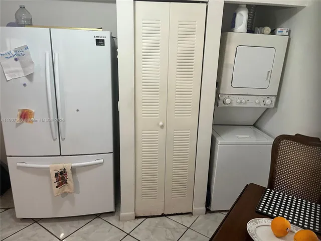 a view of hallway with washer and dryer