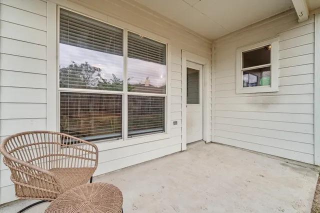 a view of a house with a large window