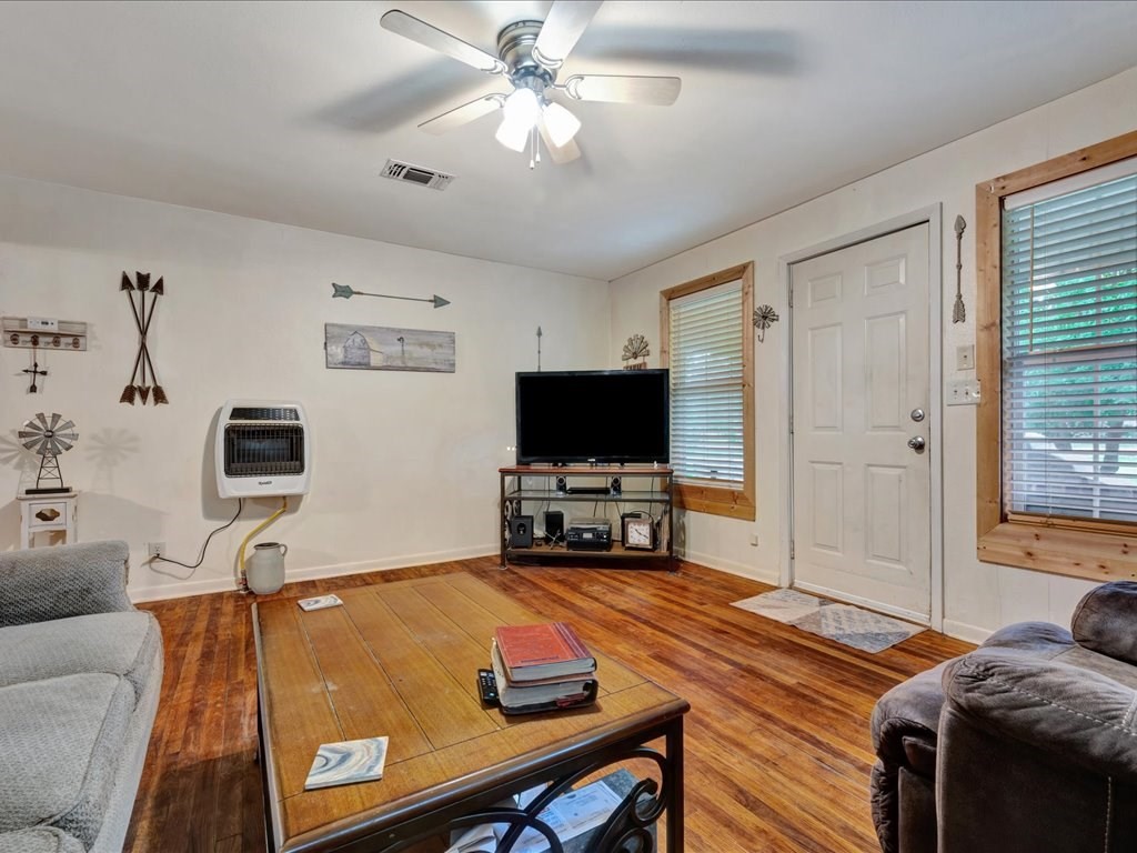 635 Oscar Berry Road Lufkin, TX 75904 - Photo 7 of 36 a living room with furniture and a flat screen tv