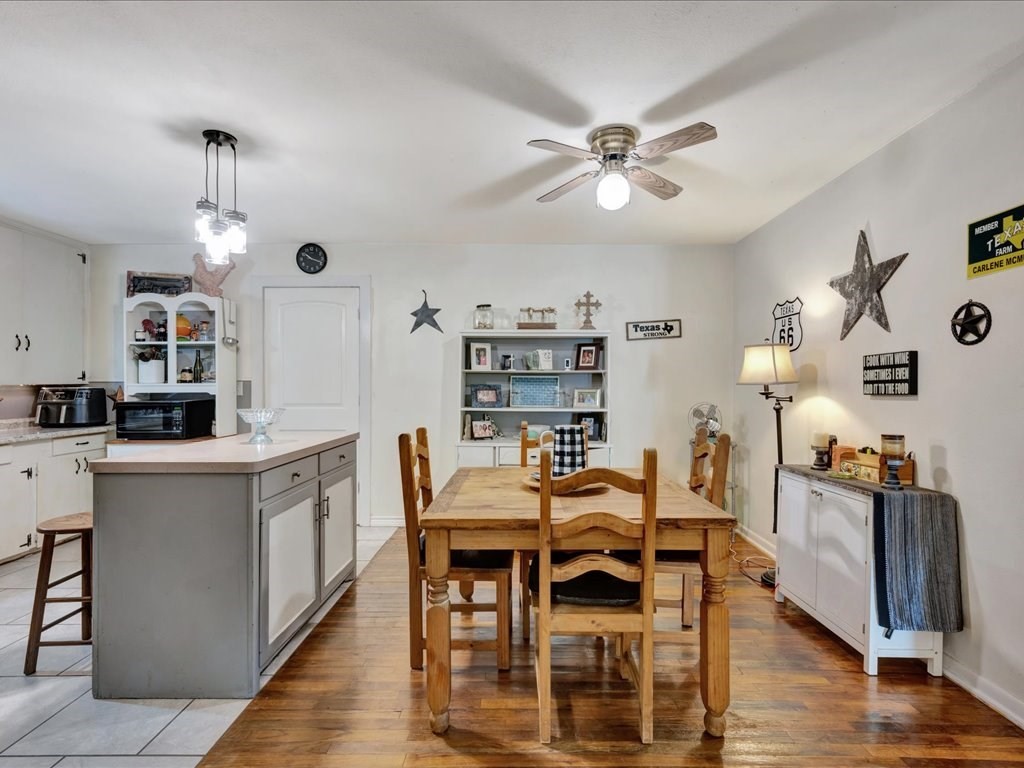 635 Oscar Berry Road Lufkin, TX 75904 - Photo 8 of 36 a view of kitchen with cabinets and wooden floor