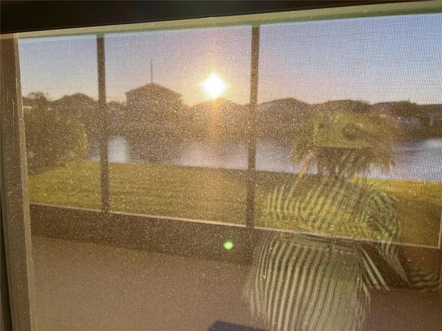 a view of a lake with a city