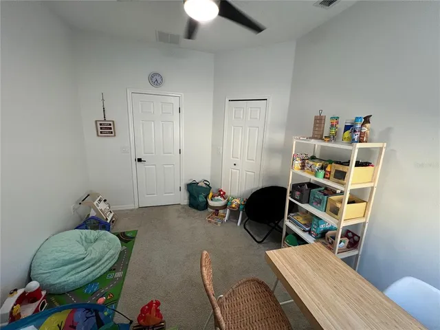 a room with furniture and a window