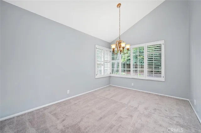 a kitchen with stainless steel appliances a stove a microwave and a refrigerator