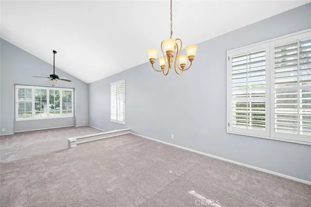 a kitchen with stainless steel appliances a refrigerator sink and cabinets