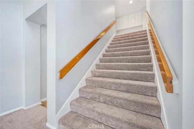 an empty room with a ceiling fan and closet
