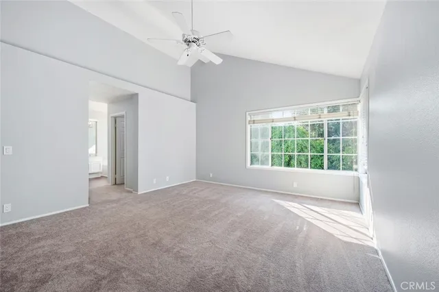 a backyard of a house with barbeque oven