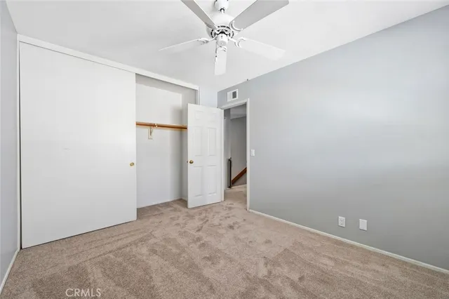 an aerial view of a houses and city street