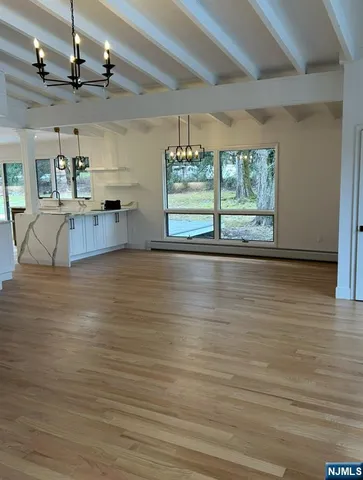 a large room with wooden floor